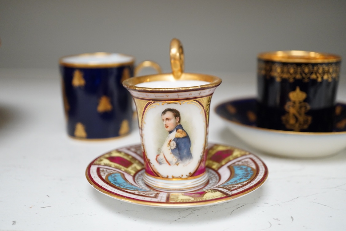 A 19th century Sevres style Napoleon cup, together with a similar cup and saucer and a Naples cup and saucer, cup 8cm from top of handle to base.
